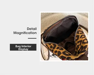 Detail showing the leopard print faux suede interior with metal zipper and dark fabric lining