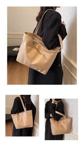 Macro shot of large beige faux leather tote bag with fine litchi texture and long strap