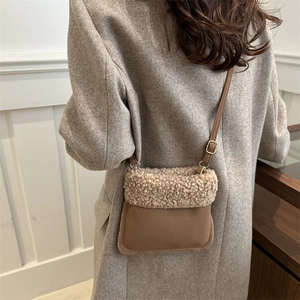 Brown fleece and wool shoulder bag for women worn with grey herringbone wool coat