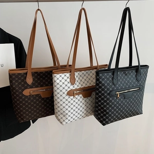 Fashionable tote bags with geometric print and zipper in brown, white, and black colors
