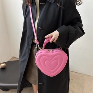 Sac bandoulière rose en forme de cœur en cuir PU avec poignée plissée et gaufrage 3D