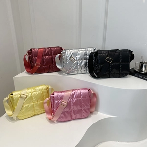 Quilted puffer tote bags in five metallic colors featuring checkerboard stitching detail