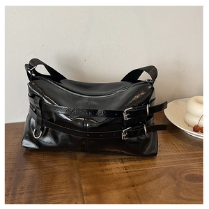 Glossy black PU shoulder bag featuring parallel leather buckles and silver hardware accents