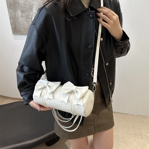 White cylinder shoulder bag with double bow design in stylish PU leather for women