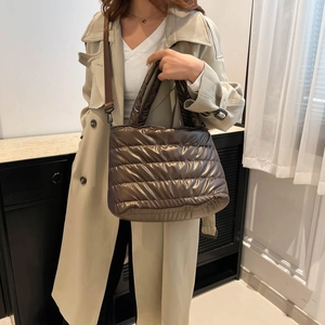 Bronze quilted space cotton tote bag with metallic finish and adjustable strap