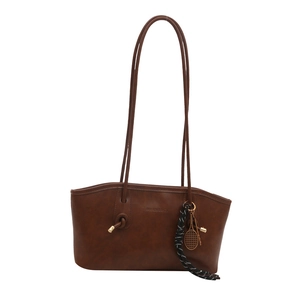Classic dark brown PU leather tote bag with fashion embossing and tennis racket pendant