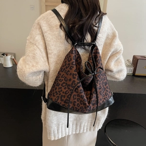Sac à dos imprimé léopard tendance avec cordon de serrage et détail de nœud en cuir chic