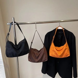 Minimalist vintage tote bags in black brown and orange suede with metal zip closure