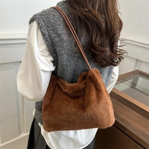 Caramel brown plush shoulder bag for women with soft faux fur and leather straps