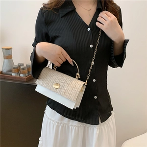 Fashionable beige woven and white leather crossbody bag with gold chain strap and ring handle