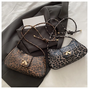 Comparison of leopard print hobo bags with gold bow buckle and knotted shoulder straps