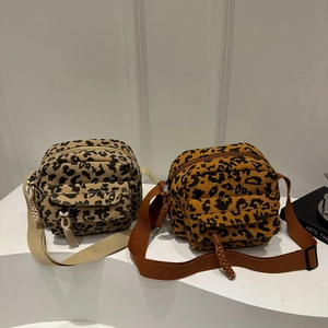 Leopard print corduroy crossbody camera bags with front flap pockets and wide straps