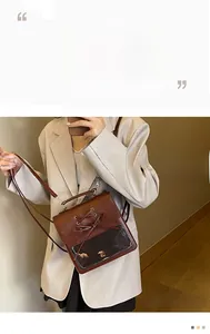 Detail of vintage dark brown faux leather backpack with bow tie and mesh pocket