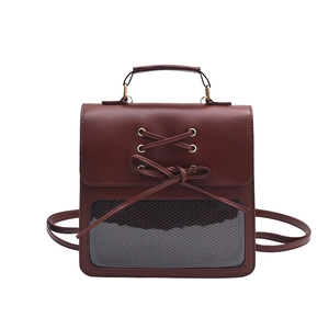 Deep brown vintage Ita-bag backpack with cute bow detail and clear window display