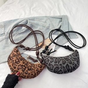 Chic leopard print crescent handbags in brown and grey with knotted shoulder straps