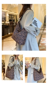 Close-up of large capacity leopard print hobo bag with durable shoulder strap detail