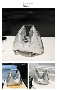 Detailed views of the spacious silver tote bag showing side pockets and its metallic texture