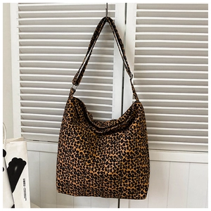 Close-up of leopard print hobo bag with an adjustable wide shoulder strap for versatility
