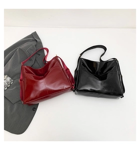 Chic hobo bags in glossy burgundy and black with adjustable straps and front pocket