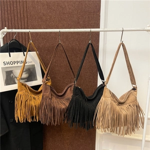 Fringed faux suede tote bags in yellow, brown, and black, bohemian style shoulder bags