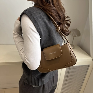 French vintage brown shoulder bag with knotted strap and minimalist flap design