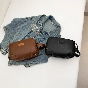 Minimalist vintage PU leather crossbody bags in black and brown with contrast stitching