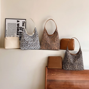 Large leopard print canvas tote bag with matching solid color clutch set for women