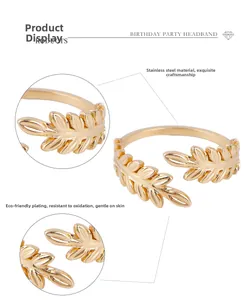 Detail view of gold adjustable stainless steel leaf ring with olive branch textures