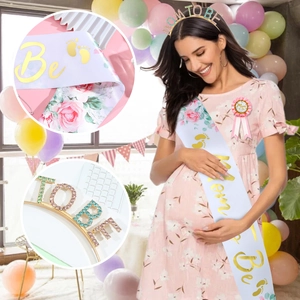Pink and gold Mom To Be baby shower set with floral sash, rhinestone headband and badge