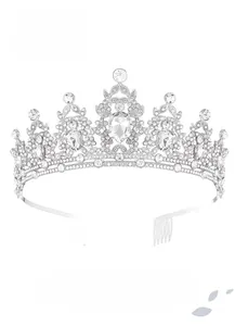Detail view of silver crystal tiara featuring teardrop rhinestones and side hair combs
