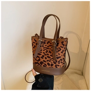 Detailed leopard print tote with faux horsehair texture and leather trim finish