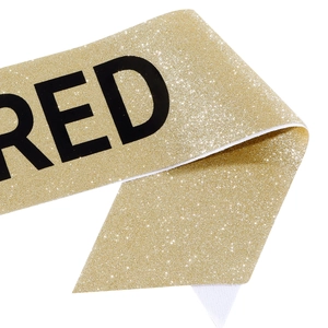 Glittery gold I'M RETIRED sash with black lettering for retirement party decoration