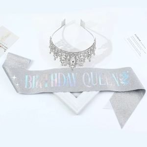 Detailed view of silver Birthday Queen sash with glitter and rhinestone crystal tiara crown