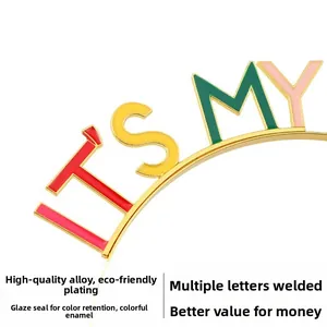 Detailed close-up of alloy birthday headband showing colorful enamel 'IT'S MY' lettering