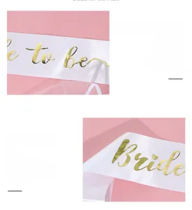Detail of Bride to Be white satin sash with elegant gold foil lettering for bridal parties