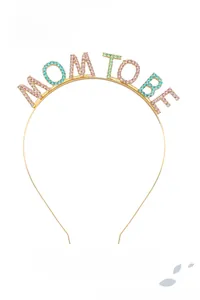 Detail of MOM TO BE metal headband with colorful rhinestones for baby shower