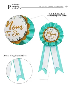 Detail of Mom To Be rosette badge with gold glitter border and floral pattern for baby shower