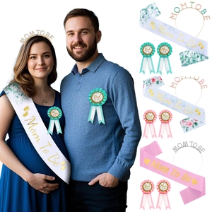 Baby shower party set with Mom To Be sash, crown headband and Dad To Be flower badges