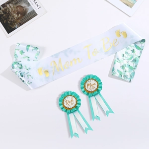Elegance Mom To Be sash and matching badges set with green leaves and gold lettering