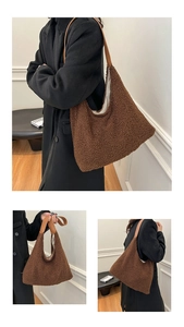 Detail of plush brown shearling tote bag with contrasting camel leather shoulder strap