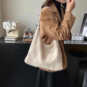 Fuzzy off-white fleece tote bag with leather straps for autumn winter season