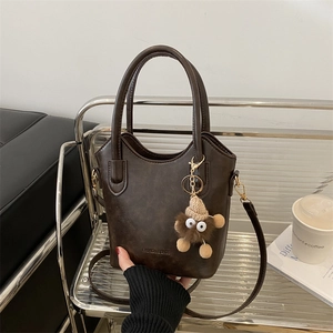 Vintage PU Leather Bucket Bag For Women Retro Solid Color Large Capacity Commuter Shoulder Crossbody Handbag With Plush Monster Pendant