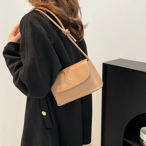 Elegant khaki crossbody square bag with silver metal bow and minimalist leather finish