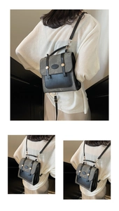 Close-up of canvas and leather patchwork backpack with gold metal buckle detailing
