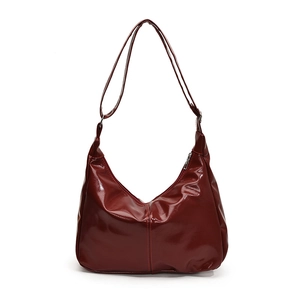 Glossy deep red faux leather hobo shoulder bag with minimalist design for women