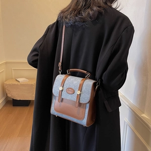 Chic patchwork crossbody and handbag in denim blue and brown leather for winter travel