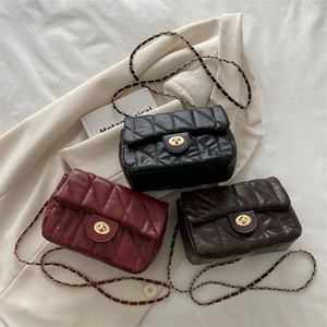 Quilted crossbody bag with gold chain strap in black, burgundy and brown colors