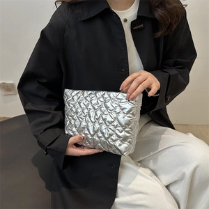 Chic silver heart quilted pouch featuring metallic finish for makeup and daily storage