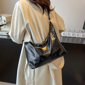 Classic black high-gloss hobo tote bag with a metallic triangular logo and large capacity