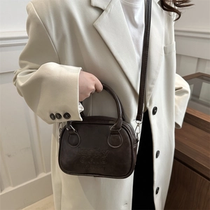 Retro dark brown crossbody bag with Lucky Ohio embossed letters and dual zippers
